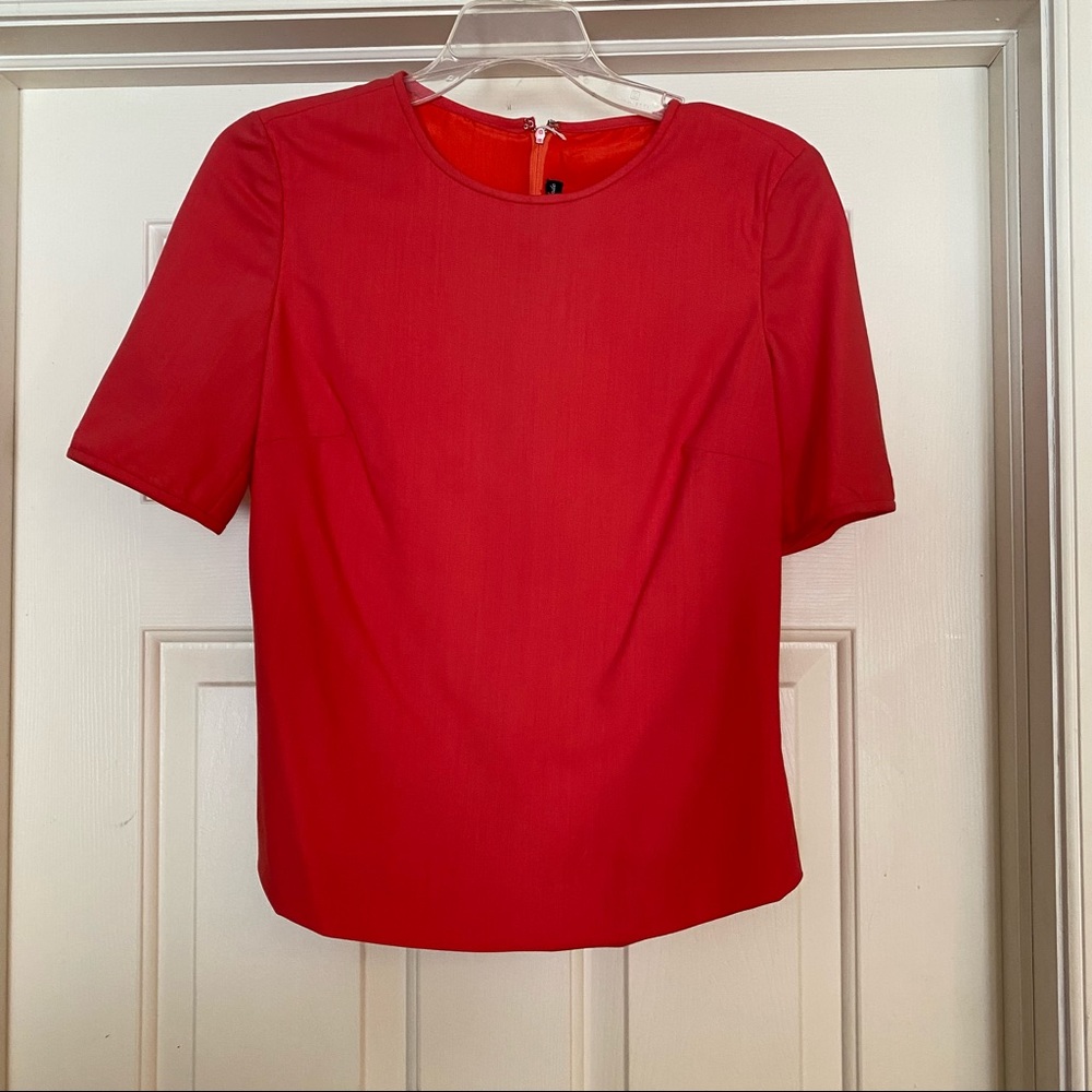Susan Van Der Linde coral top size 4